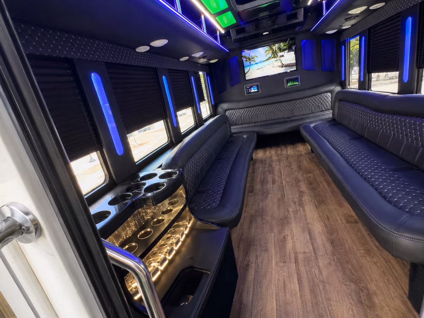 Centennial Birthday, Sweet 16, & Quinceañera Transportation party bus exterior