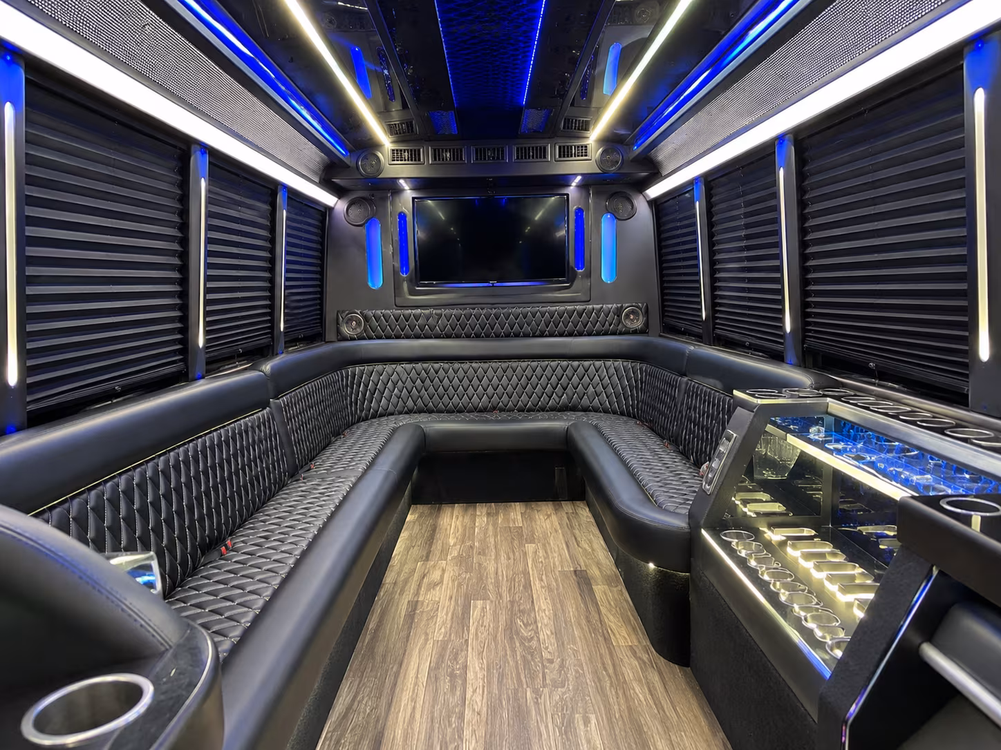 Centennial Birthday, Sweet 16, & Quinceañera Transportation party bus exterior